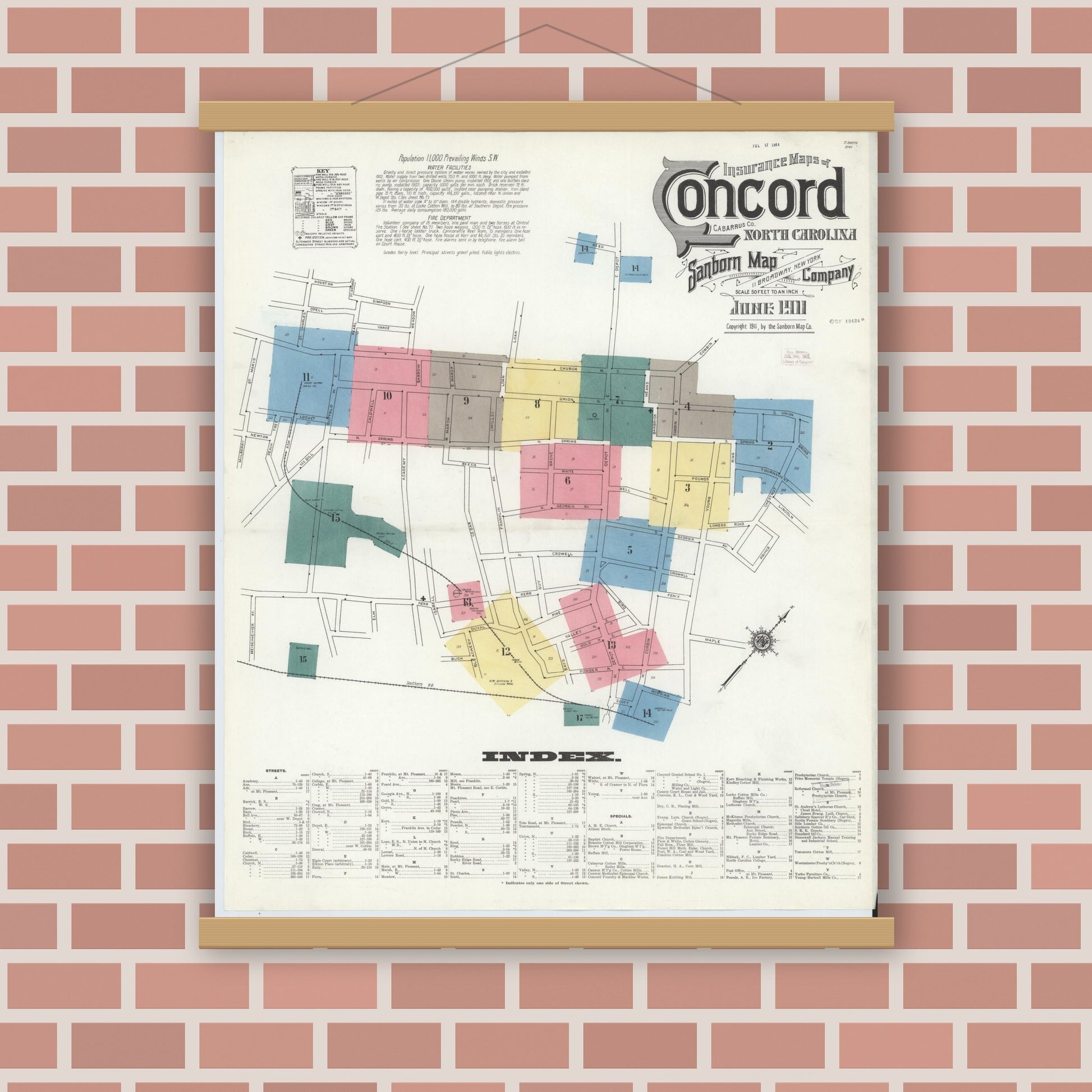Old map wall art mockup — magnetic wood frame on brick wall — Sanborn Fire Insurance Map from Concord, Cabarrus County, North Carolina (1911) - Complete Map Set