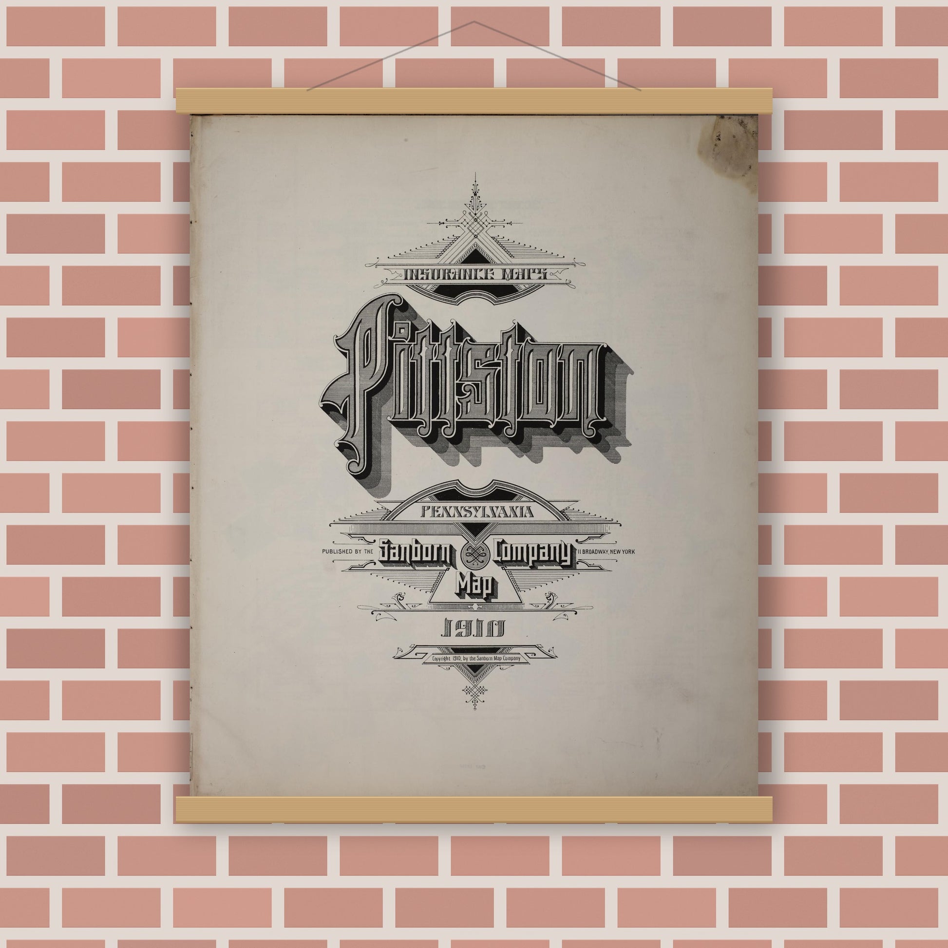 Old map wall art mockup — magnetic wood frame on brick wall — Sanborn Fire Insurance Map from Pittston, Luzerne County, Pennsylvania (1910), Sheet #0001