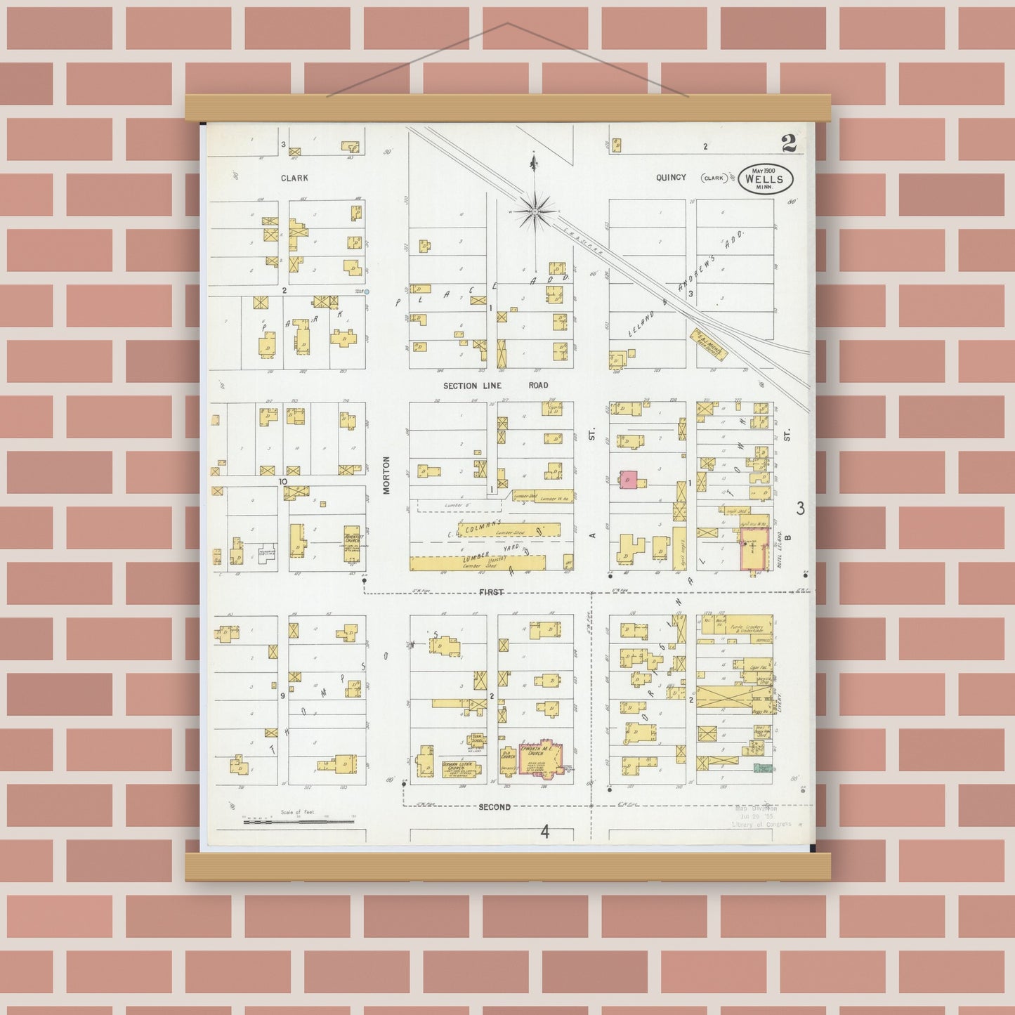 Old map wall art mockup — magnetic wood frame on brick wall — Sanborn Fire Insurance Map from Wells, Faribault County, Minnesota (1900), Sheet #0002