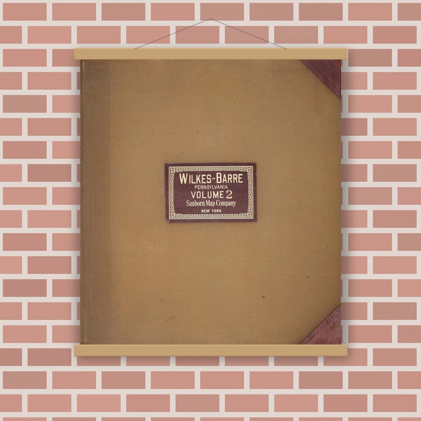 Old map wall art mockup — magnetic wood frame on brick wall — Sanborn Fire Insurance Map from Wilkes Barre, Luzerne County, Pennsylvania (1950), Sheet #0001