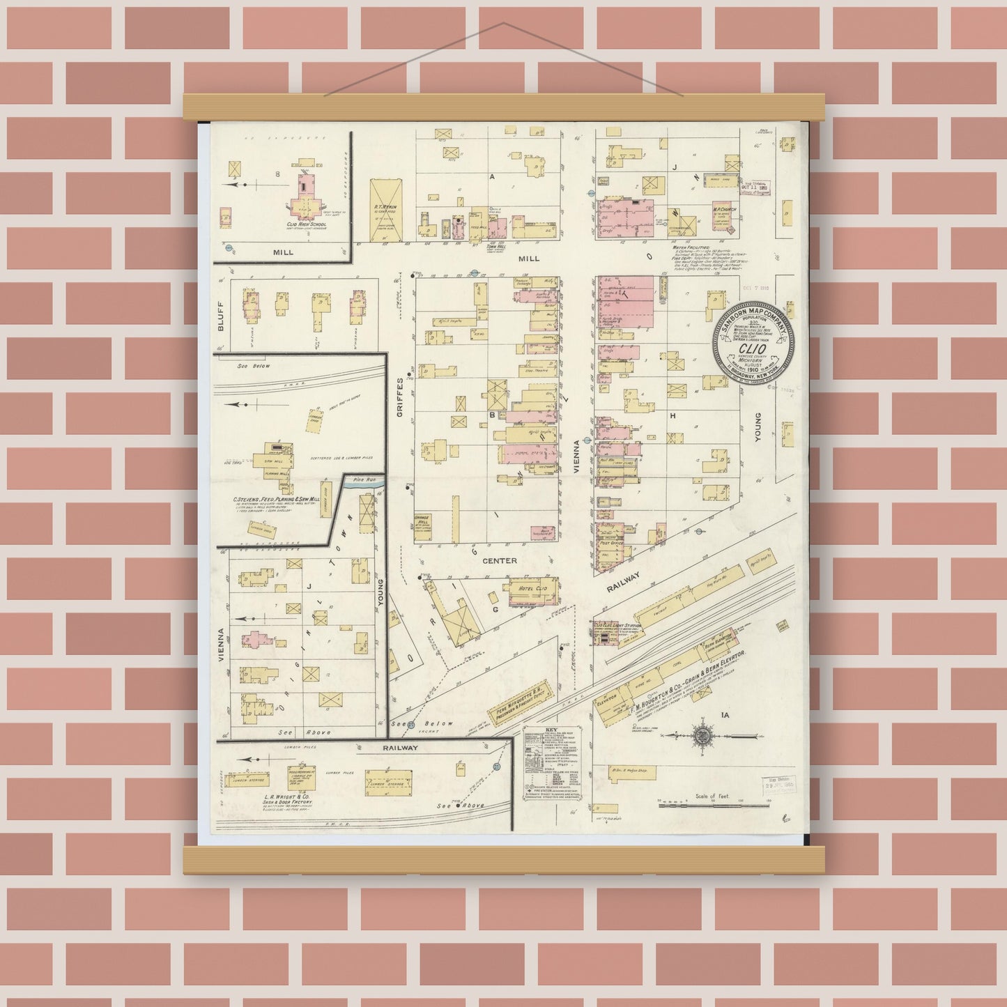 Old map wall art mockup — magnetic wood frame on brick wall — Sanborn Fire Insurance Map from Clio, Genesee County, Michigan (1910), Sheet #0001