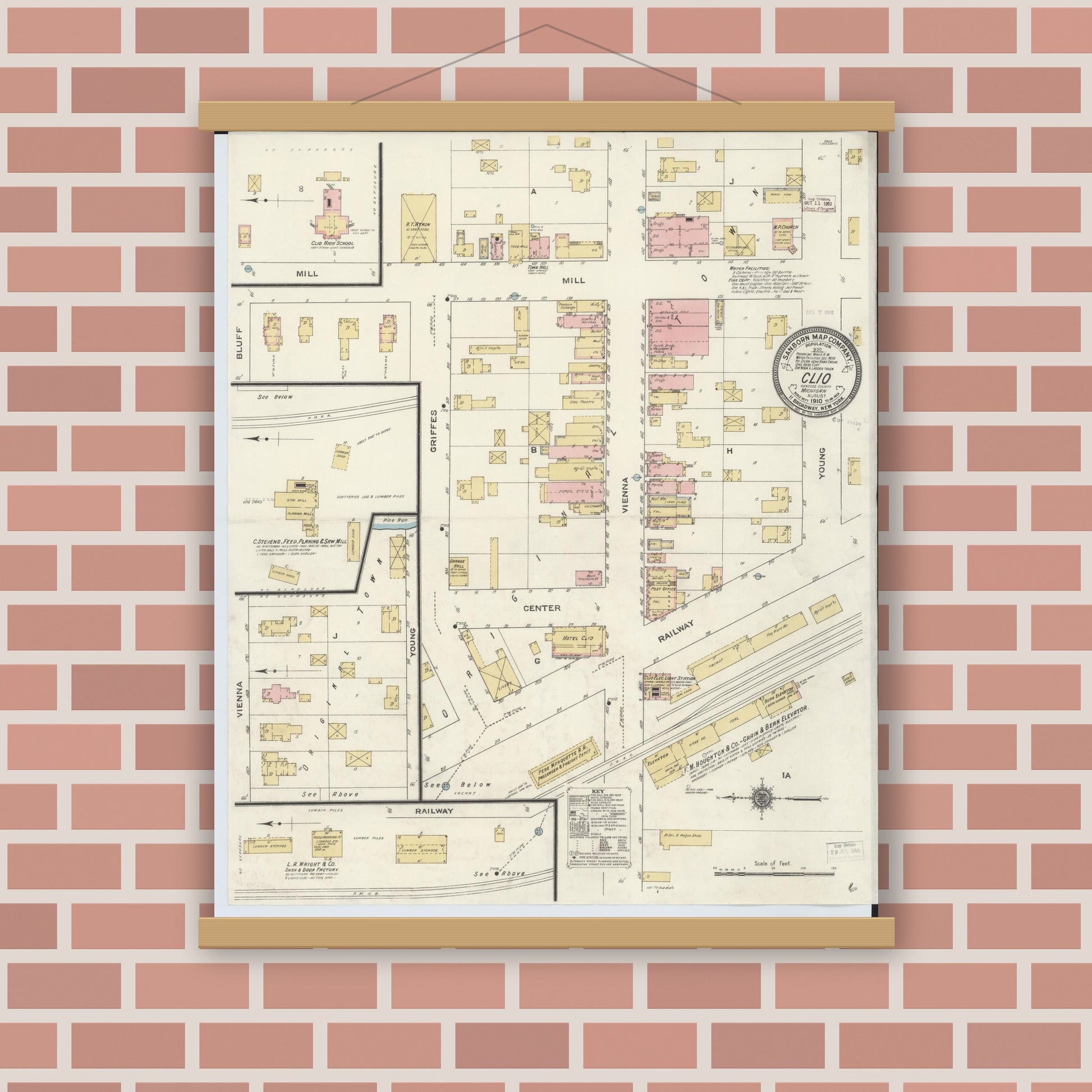 Old map wall art mockup — magnetic wood frame on brick wall — Sanborn Fire Insurance Map from Clio, Genesee County, Michigan (1910), Sheet #0001