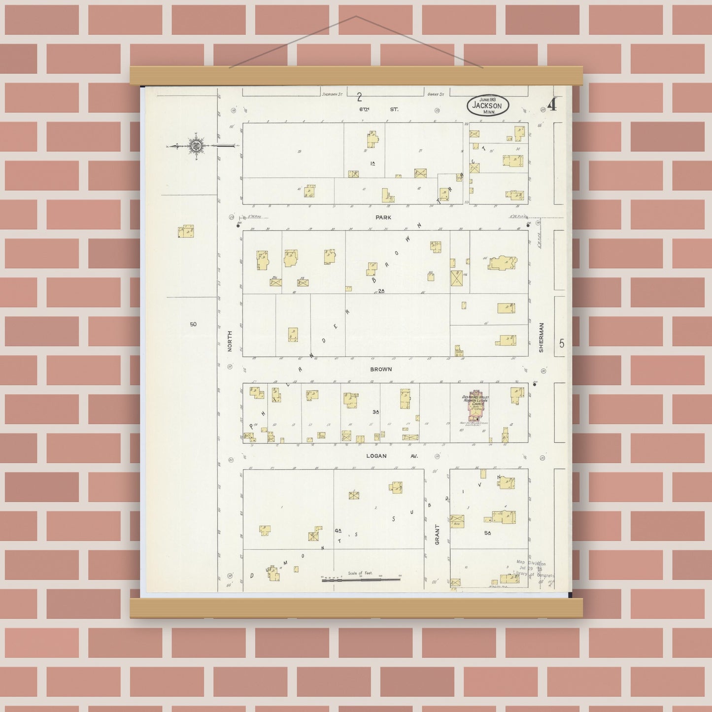 Old map wall art mockup — magnetic wood frame on brick wall — Sanborn Fire Insurance Map from Jackson, Jackson County, Minnesota (1913), Sheet #0004