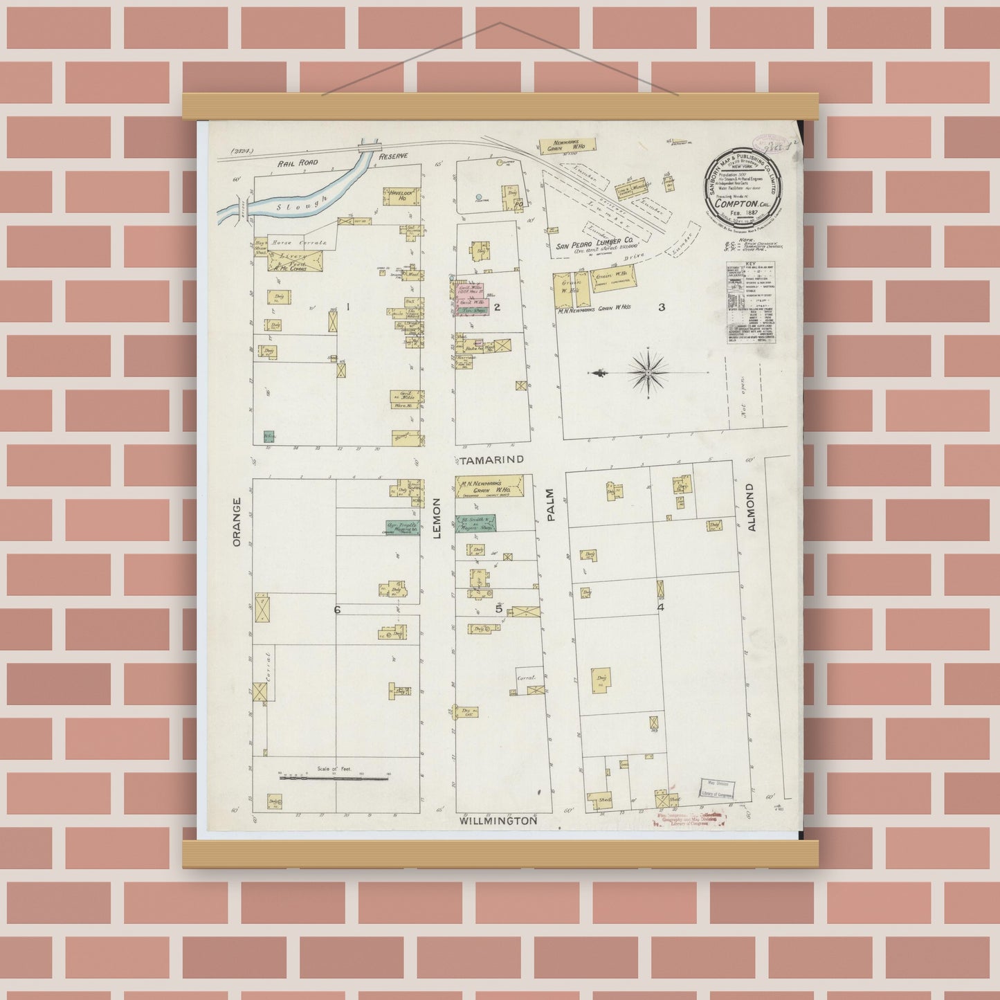 Old map wall art mockup — magnetic wood frame on brick wall — Sanborn Fire Insurance Map from Compton, Los Angeles County, California (1887), Sheet #0001