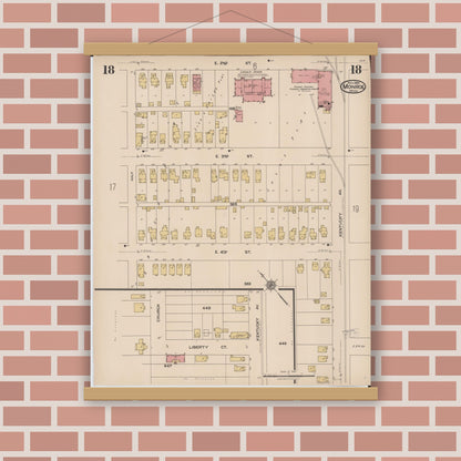 Old map wall art mockup — magnetic wood frame on brick wall — Sanborn Fire Insurance Map from Monroe, Monroe County, Michigan (1922), Sheet #0018