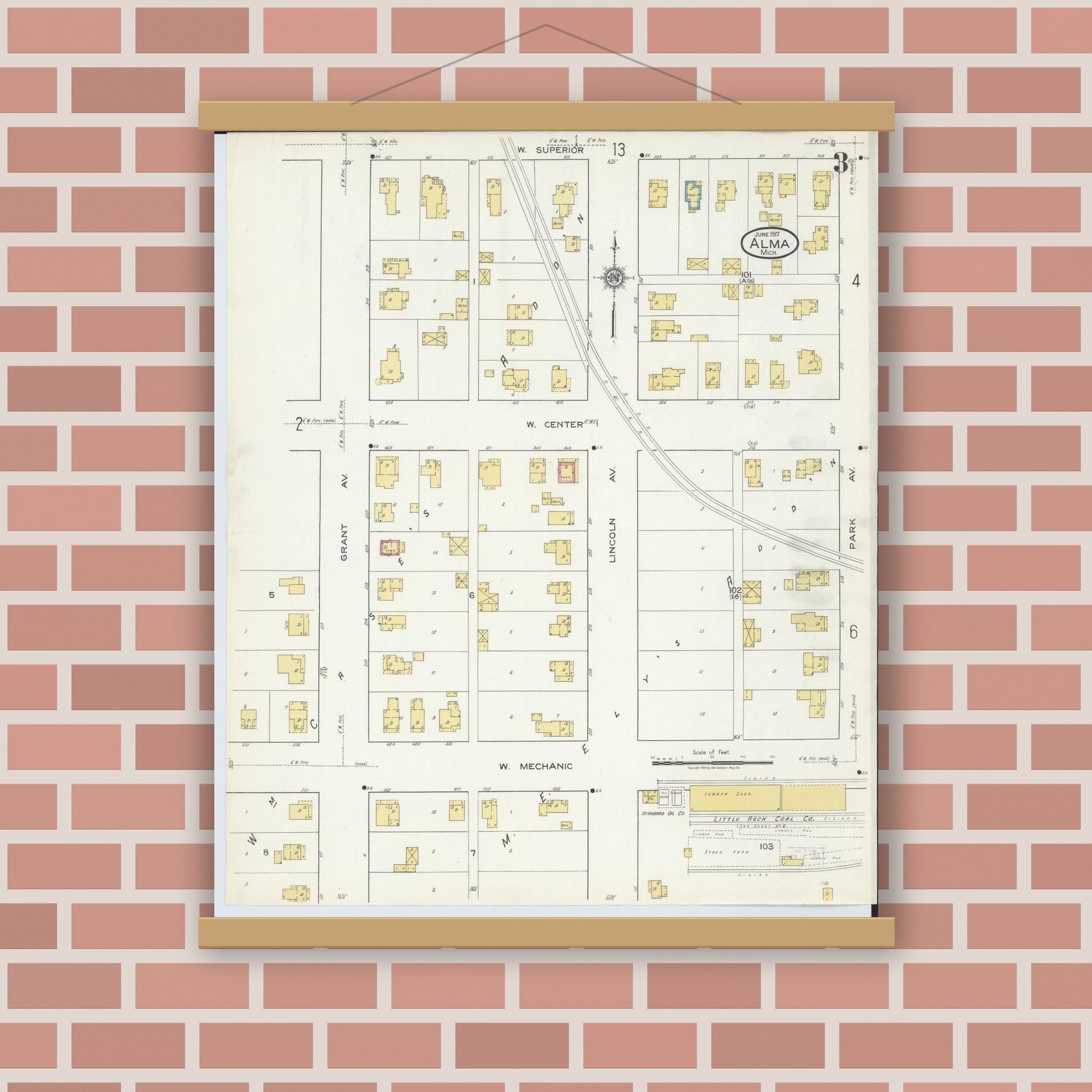 Old map wall art mockup — magnetic wood frame on brick wall — Sanborn Fire Insurance Map from Alma, Gratiot County, Michigan (1917), Sheet #0003