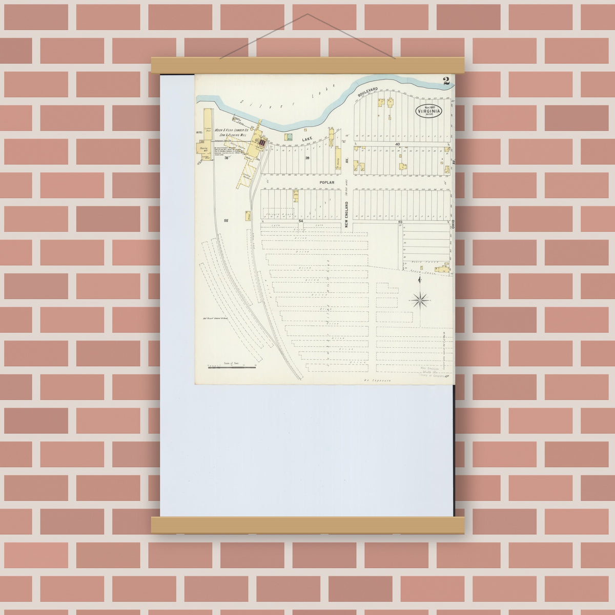 Old map wall art mockup — magnetic wood frame on brick wall — Sanborn Fire Insurance Map from Virginia, Saint Louis County, Minnesota (1897), Sheet #0002