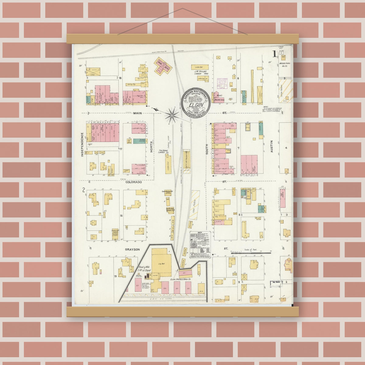 Old map wall art mockup — magnetic wood frame on brick wall — Sanborn Fire Insurance Map from Elgin, Bastrop County, Texas (1905), Sheet #0001