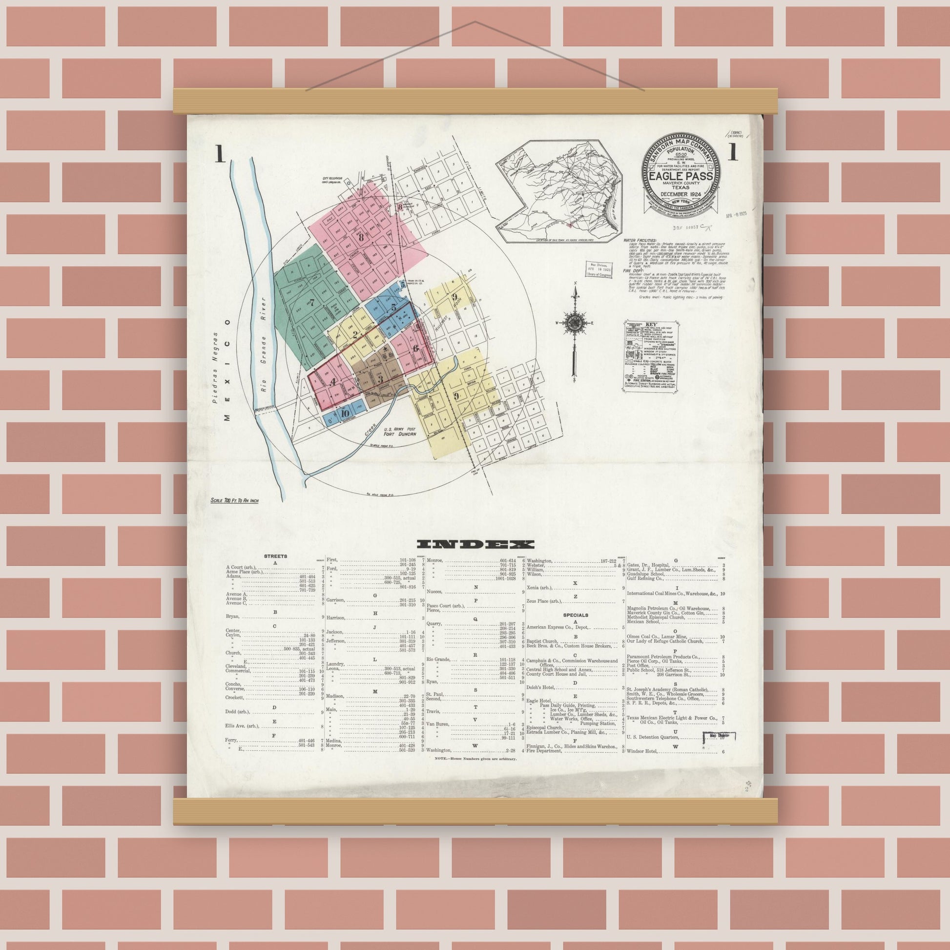 Old map wall art mockup — magnetic wood frame on brick wall — Sanborn Fire Insurance Map from Eagle Pass, Maverick County, Texas (1924), Sheet #0001
