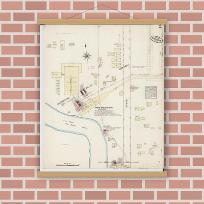 Old map wall art mockup — magnetic wood frame on brick wall — Sanborn Fire Insurance Map from Oscoda, Iosco County, Michigan (1884), Sheet #0002