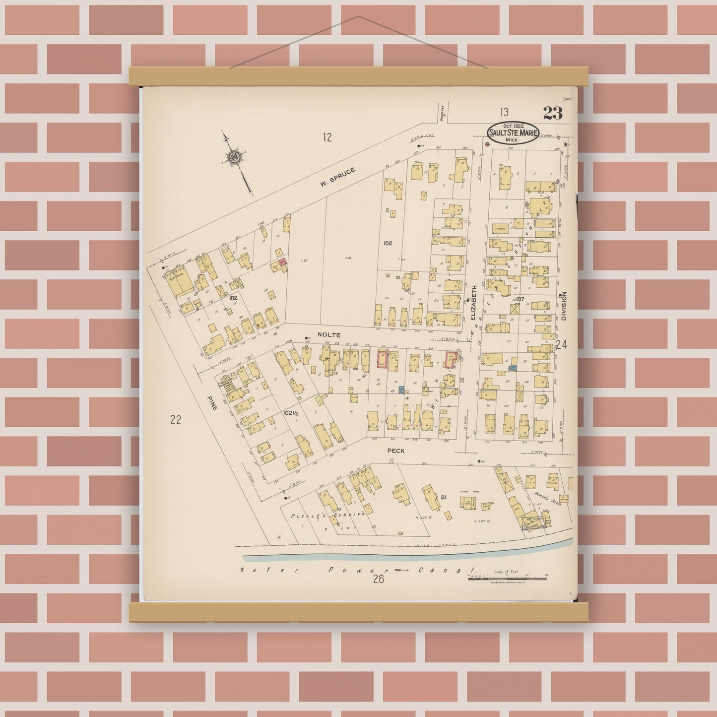 Old map wall art mockup — magnetic wood frame on brick wall — Sanborn Fire Insurance Map from Sault Sainte Marie, Chippewa County, Michigan (1922), Sheet #0023