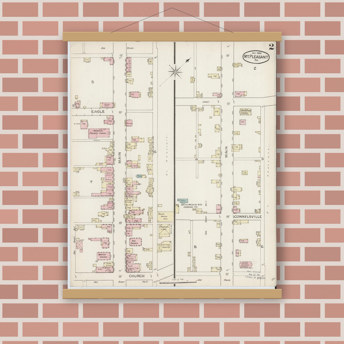 Old map wall art mockup — magnetic wood frame on brick wall — Sanborn Fire Insurance Map from Mount Pleasant, Westmoreland County, Pennsylvania (1886), Sheet #0002
