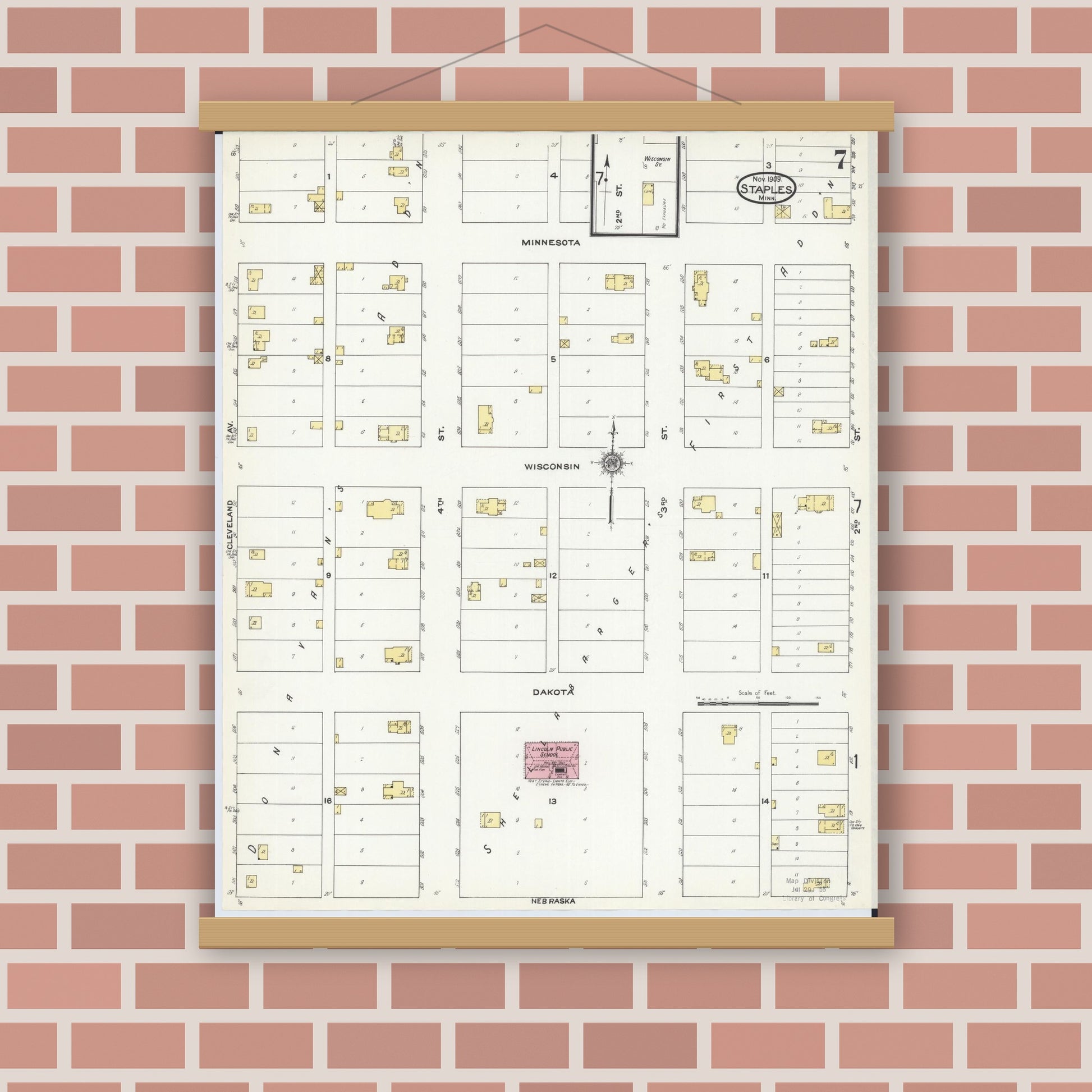 Old map wall art mockup — magnetic wood frame on brick wall — Sanborn Fire Insurance Map from Staples, Todd County, Minnesota (1909), Sheet #0007