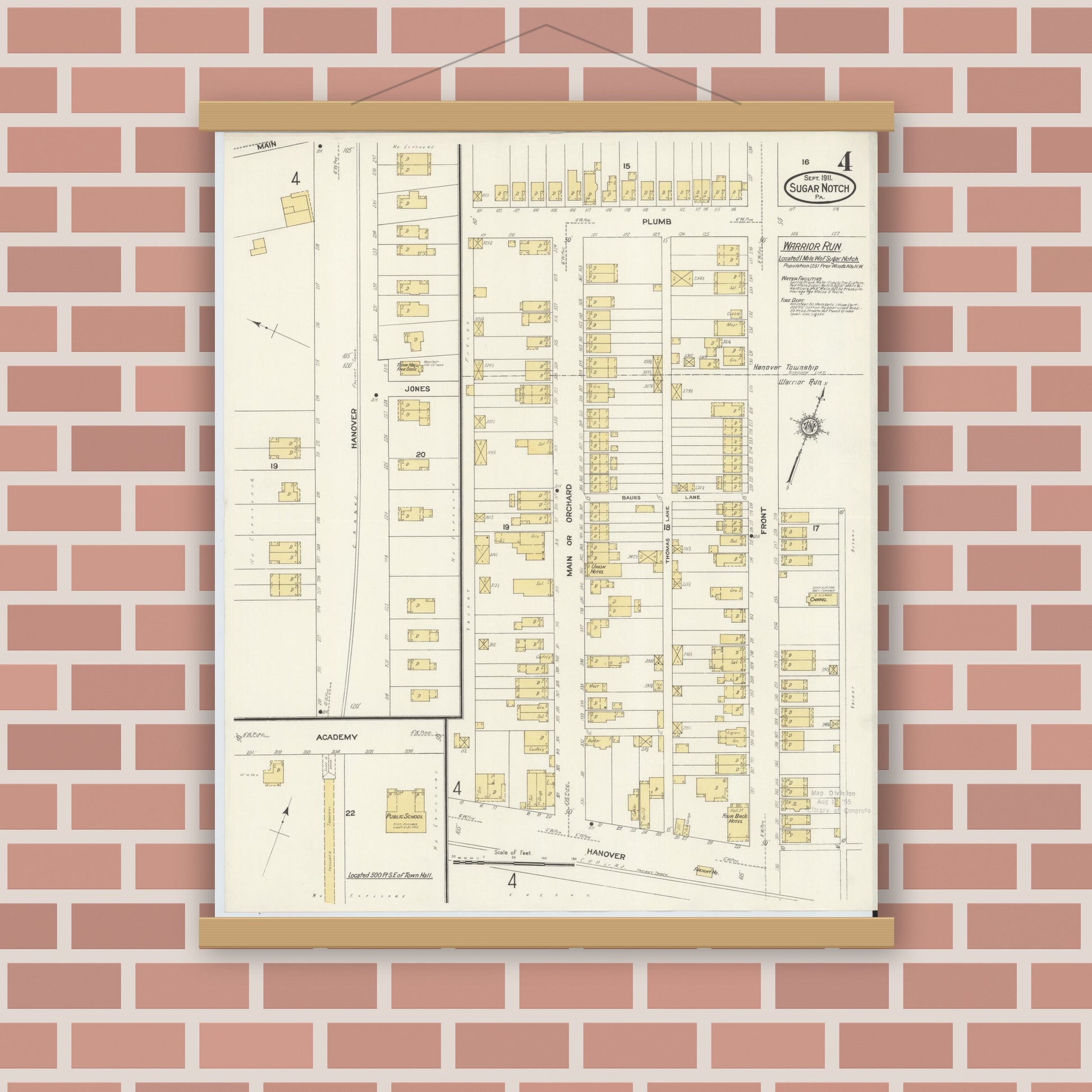 Old map wall art mockup — magnetic wood frame on brick wall — Sanborn Fire Insurance Map from Sugar Notch, Luzerne County, Pennsylvania (1911), Sheet #0004