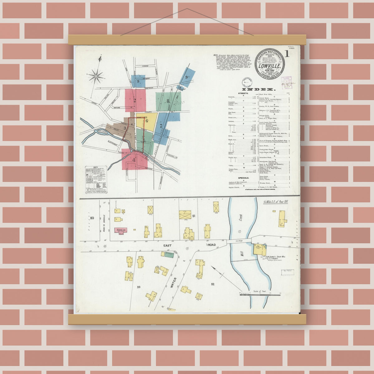 Old map wall art mockup — magnetic wood frame on brick wall — Sanborn Fire Insurance Map from Lowville, Lewis County, New York (1902) - Complete Map Set