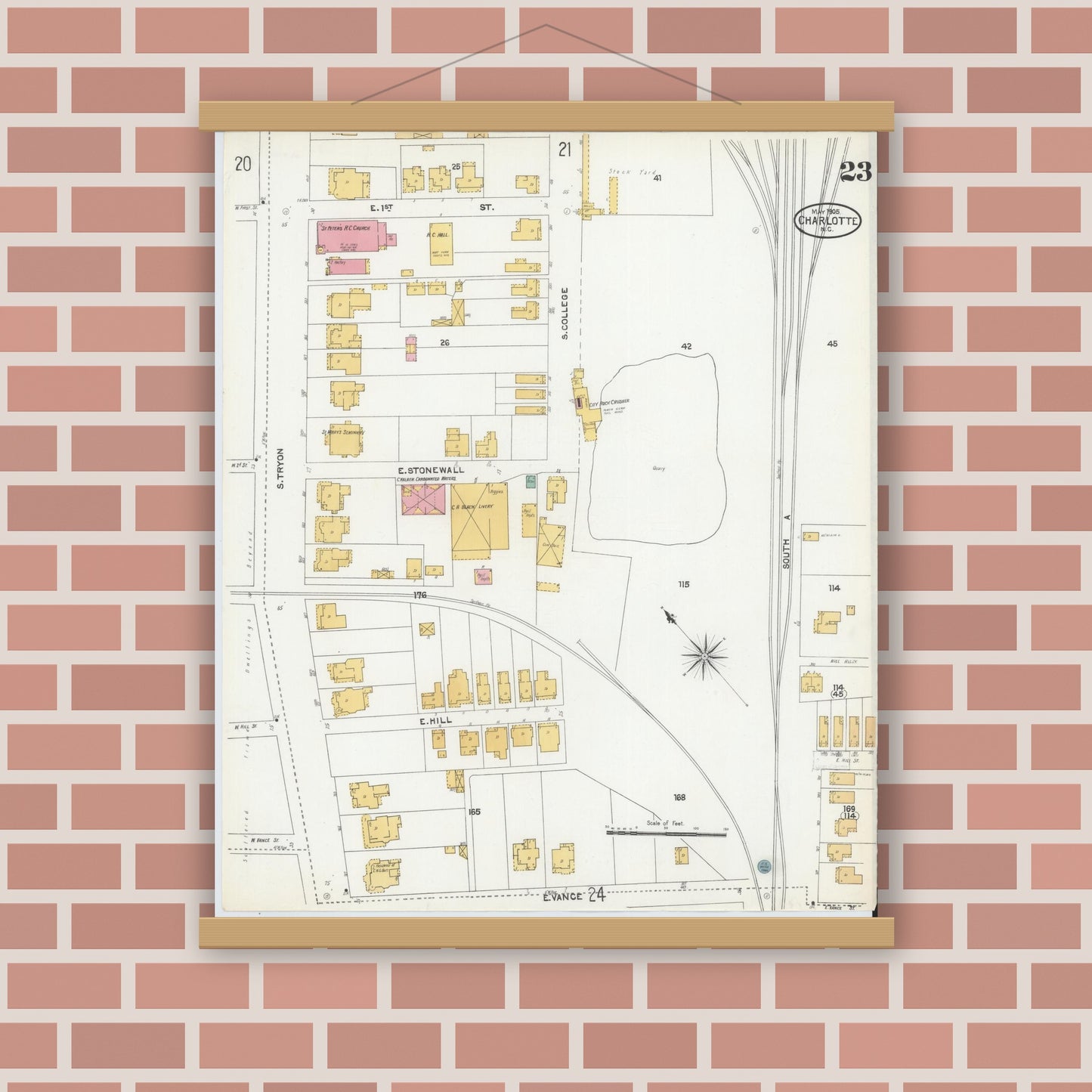 Old map wall art mockup — magnetic wood frame on brick wall — Sanborn Fire Insurance Map from Charlotte, Mecklenburg County, North Carolina (1905), Sheet #0023