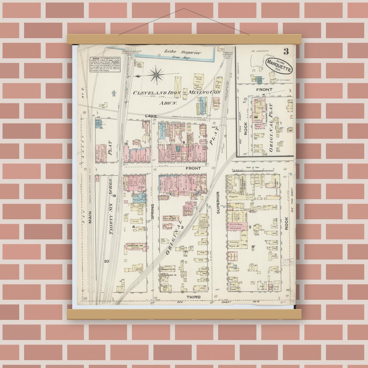 Old map wall art mockup — magnetic wood frame on brick wall — Sanborn Fire Insurance Map from Marquette, Marquette County, Michigan (1884), Sheet #0003