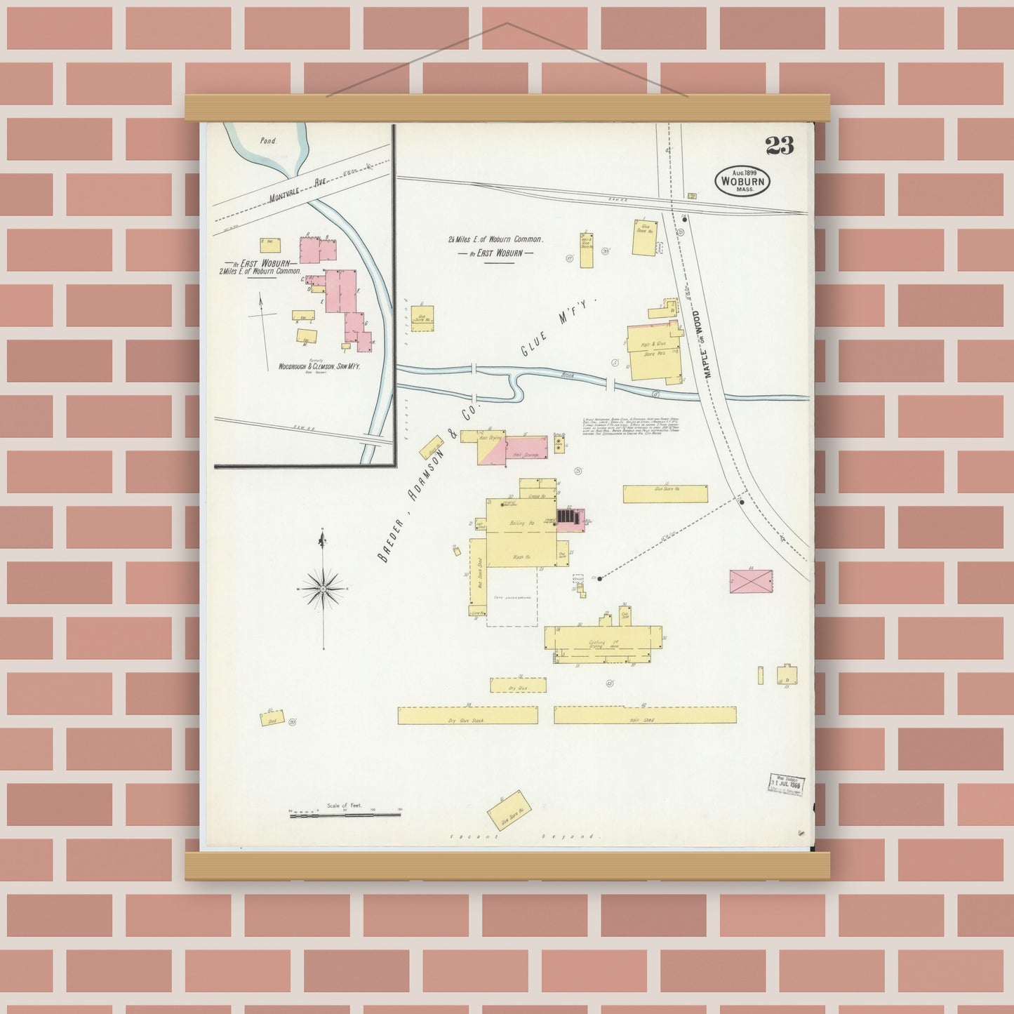 Old map wall art mockup — magnetic wood frame on brick wall — Sanborn Fire Insurance Map from Woburn, Middlesex County, Massachusetts (1899), Sheet #0023