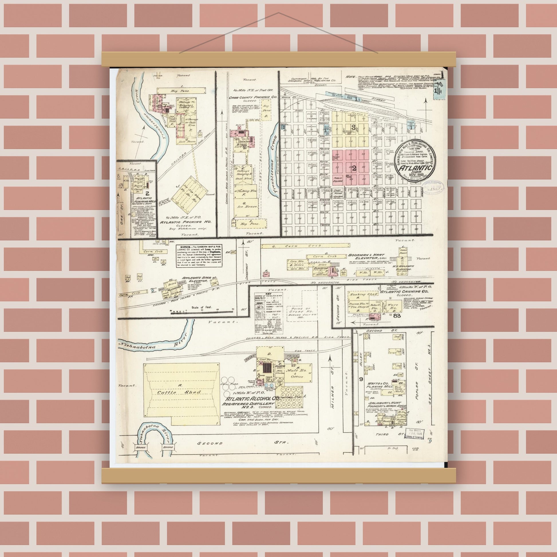 Old map wall art mockup — magnetic wood frame on brick wall — Sanborn Fire Insurance Map from Atlantic, Cass County, Iowa (1883) â€” Complete Set