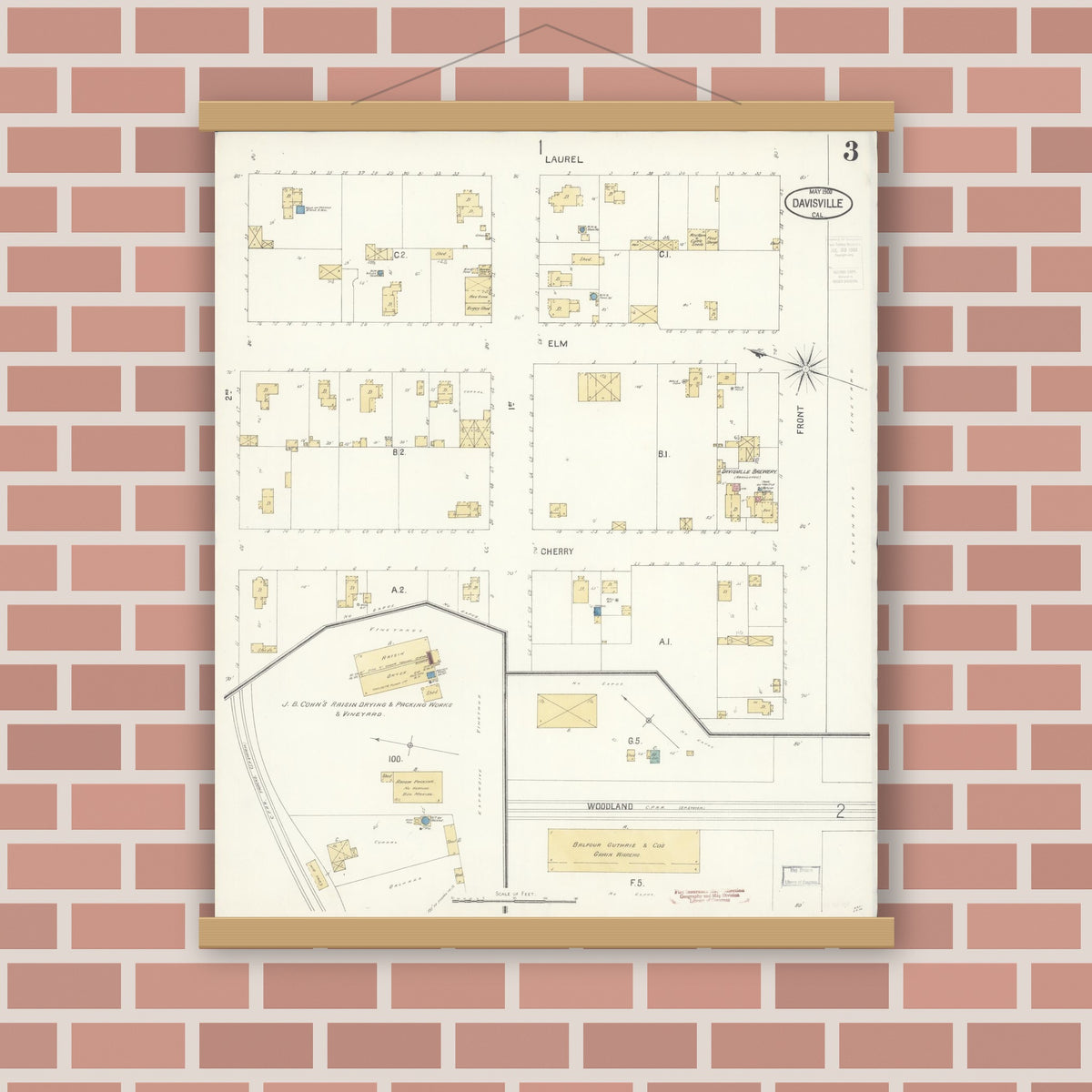 Old map wall art mockup — magnetic wood frame on brick wall — Sanborn Fire Insurance Map from Davis, Yolo County, California (1900), Sheet #0003