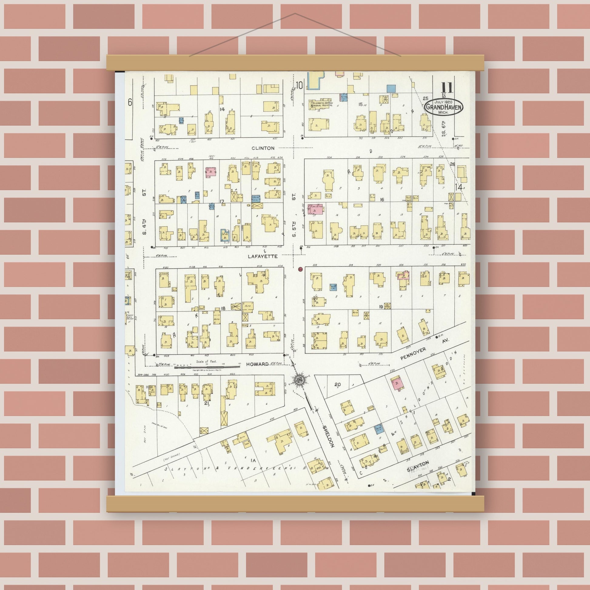 Old map wall art mockup — magnetic wood frame on brick wall — Sanborn Fire Insurance Map from Grand Haven, Ottawa County, Michigan (1920), Sheet #0011