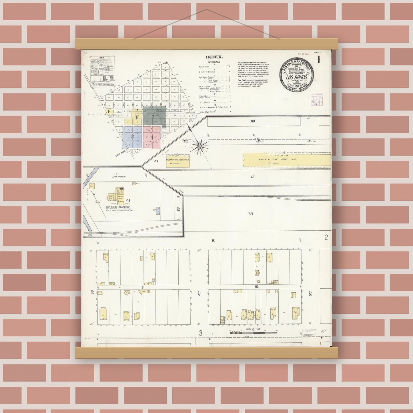 Old map wall art mockup — magnetic wood frame on brick wall — Sanborn Fire Insurance Map from Los Banos, Merced County, California (1908), Sheet #0001
