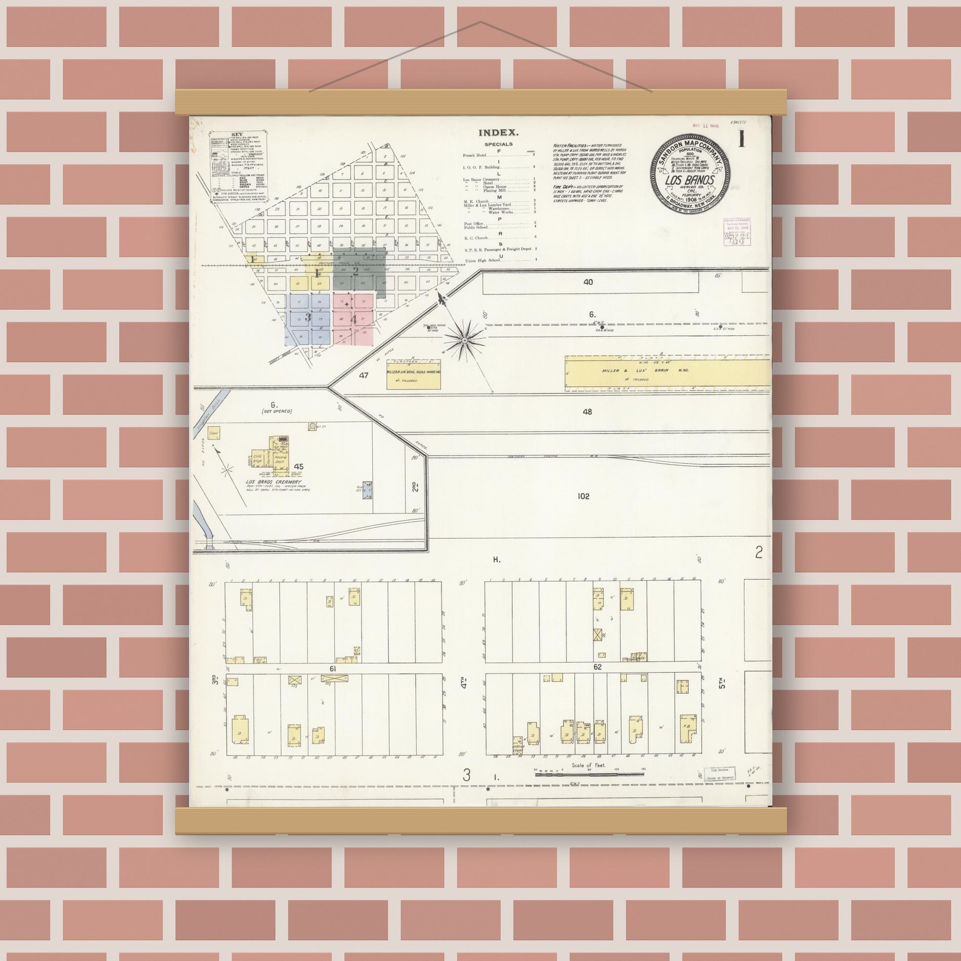 Old map wall art mockup — magnetic wood frame on brick wall — Sanborn Fire Insurance Map from Los Banos, Merced County, California (1908), Sheet #0001
