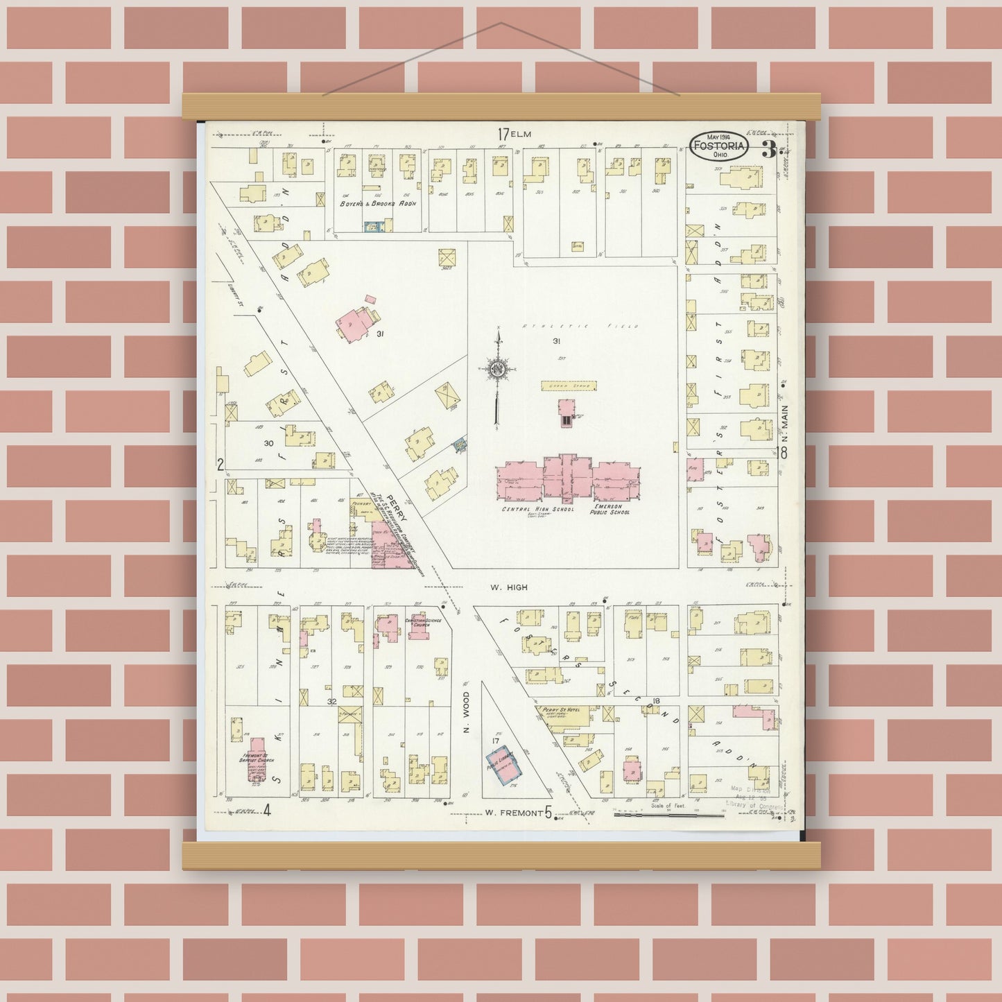 Old map wall art mockup — magnetic wood frame on brick wall — Sanborn Fire Insurance Map from Fostoria, Seneca, Hancock, And Wood Counties, Ohio (1914), Sheet #0003