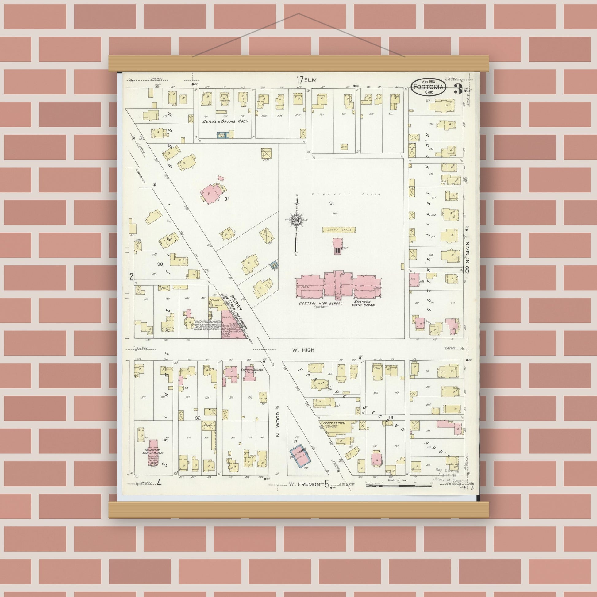Old map wall art mockup — magnetic wood frame on brick wall — Sanborn Fire Insurance Map from Fostoria, Seneca, Hancock, And Wood Counties, Ohio (1914), Sheet #0003