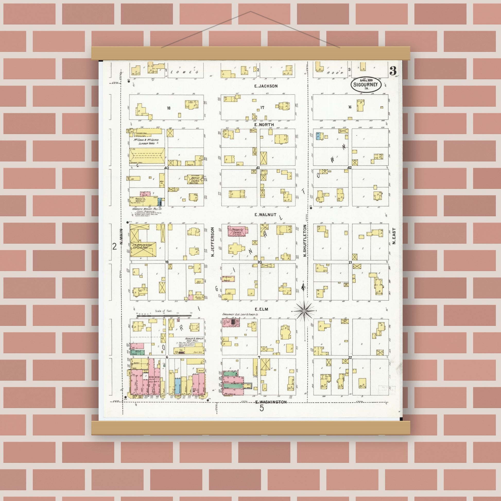 Old map wall art mockup — magnetic wood frame on brick wall — Sanborn Fire Insurance Map from Sigourney, Kiokuk County, Iowa (1899), Sheet #0003