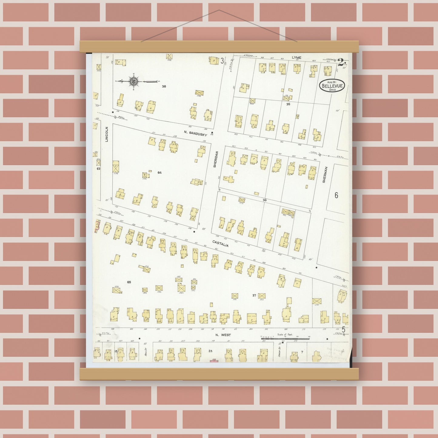 Old map wall art mockup — magnetic wood frame on brick wall — Sanborn Fire Insurance Map from Bellevue, Huron And Sandusky County, Ohio (1911), Sheet #0002