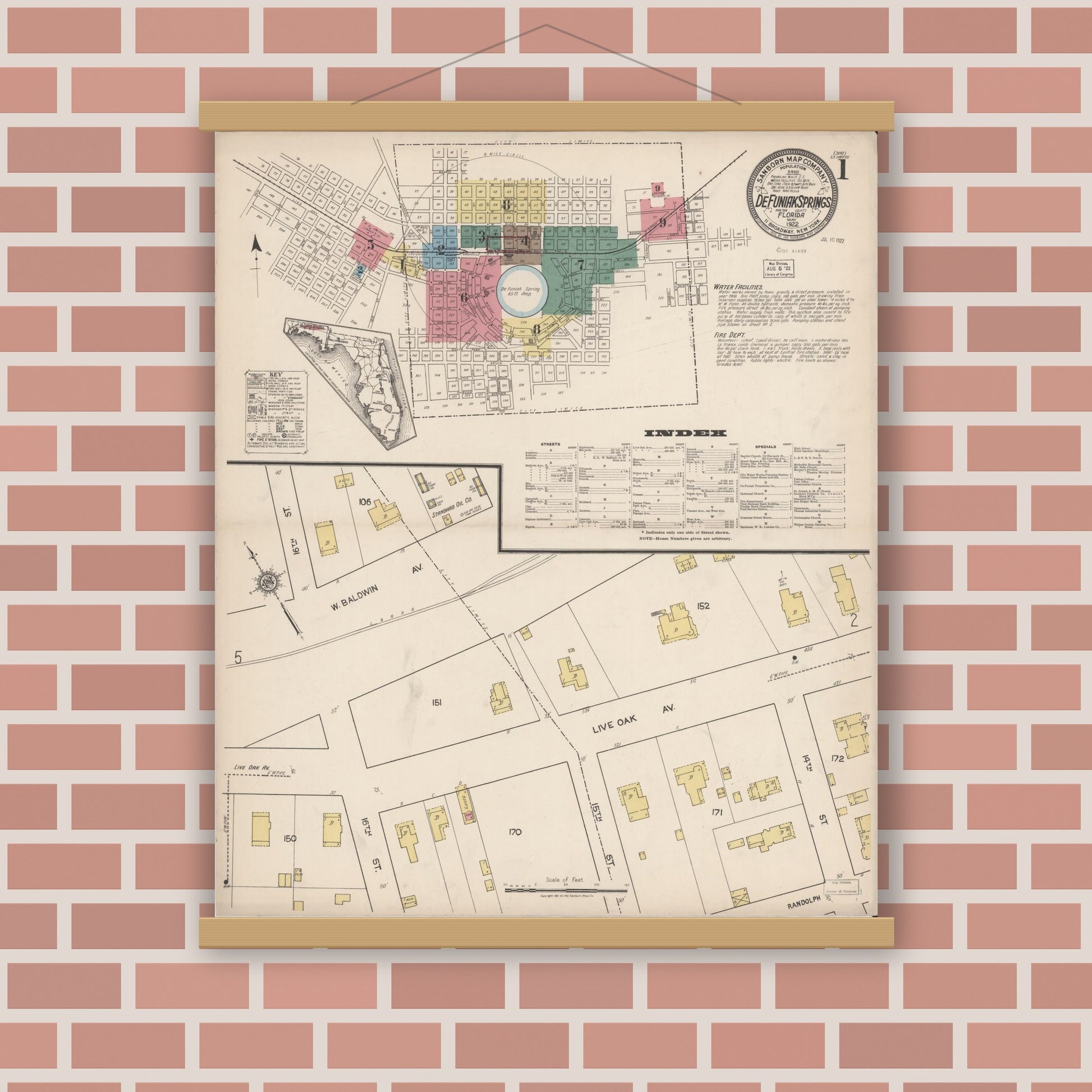 Old map wall art mockup — magnetic wood frame on brick wall — Sanborn Fire Insurance Map from De Funiak Springs, Walton County, Florida (1922), Sheet #0001