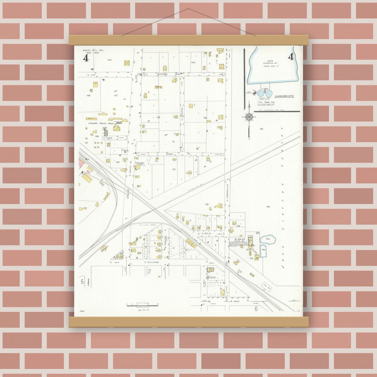 Old map wall art mockup — magnetic wood frame on brick wall — Sanborn Fire Insurance Map from Wolfe City, Hunt County, Texas (1934), Sheet #0004