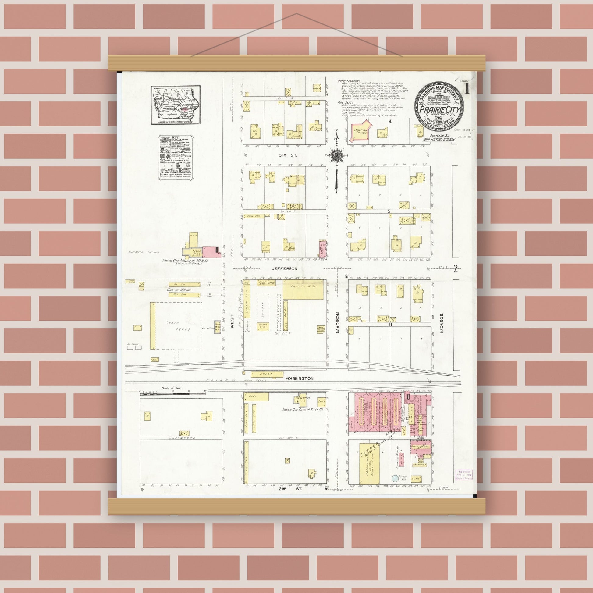 Old map wall art mockup — magnetic wood frame on brick wall — Sanborn Fire Insurance Map from Prairie City, Jasper County, Iowa (1916) â€” Complete Set