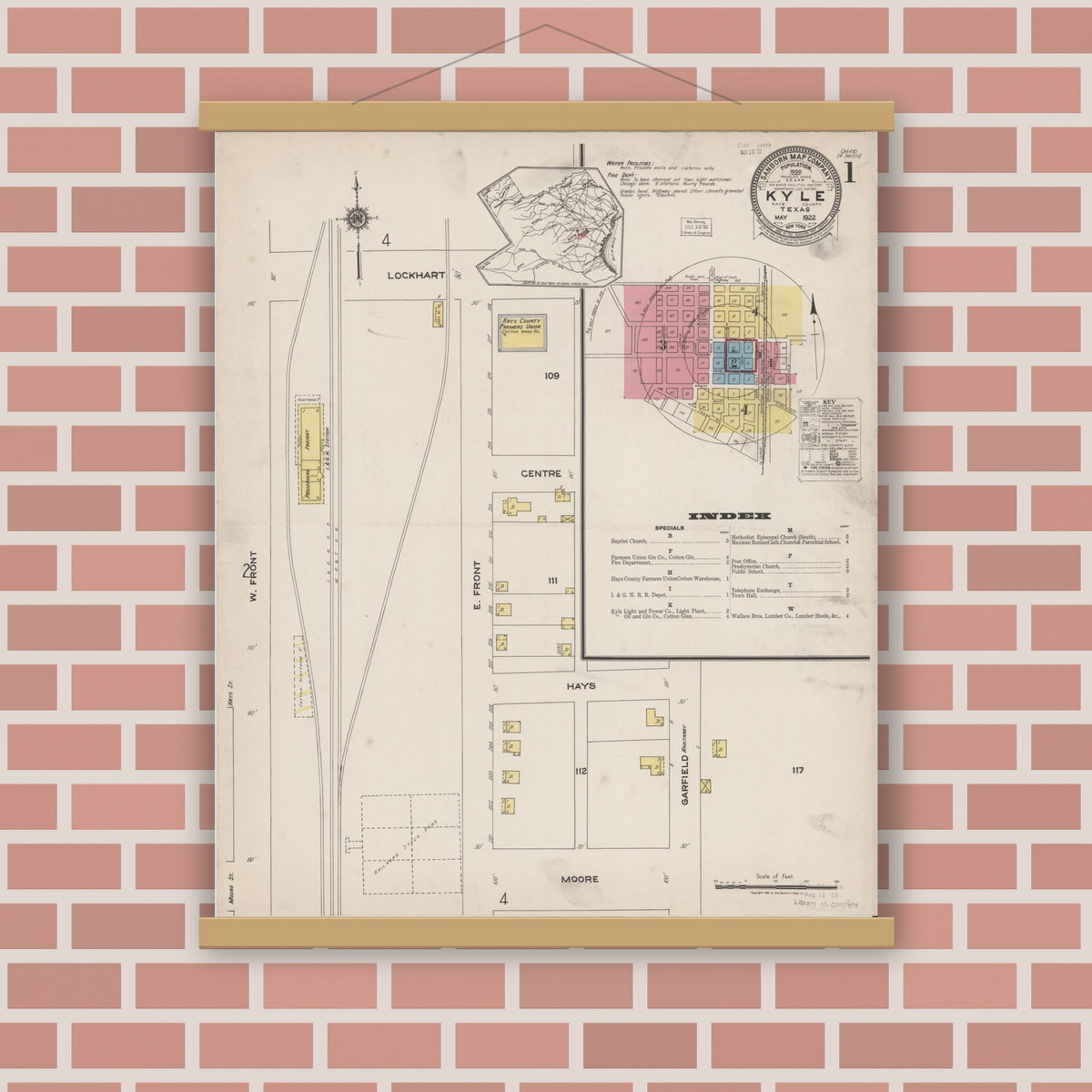 Old map wall art mockup — magnetic wood frame on brick wall — Sanborn Fire Insurance Map from Kyle, Hays County, Texas (1922) - Complete Map Set