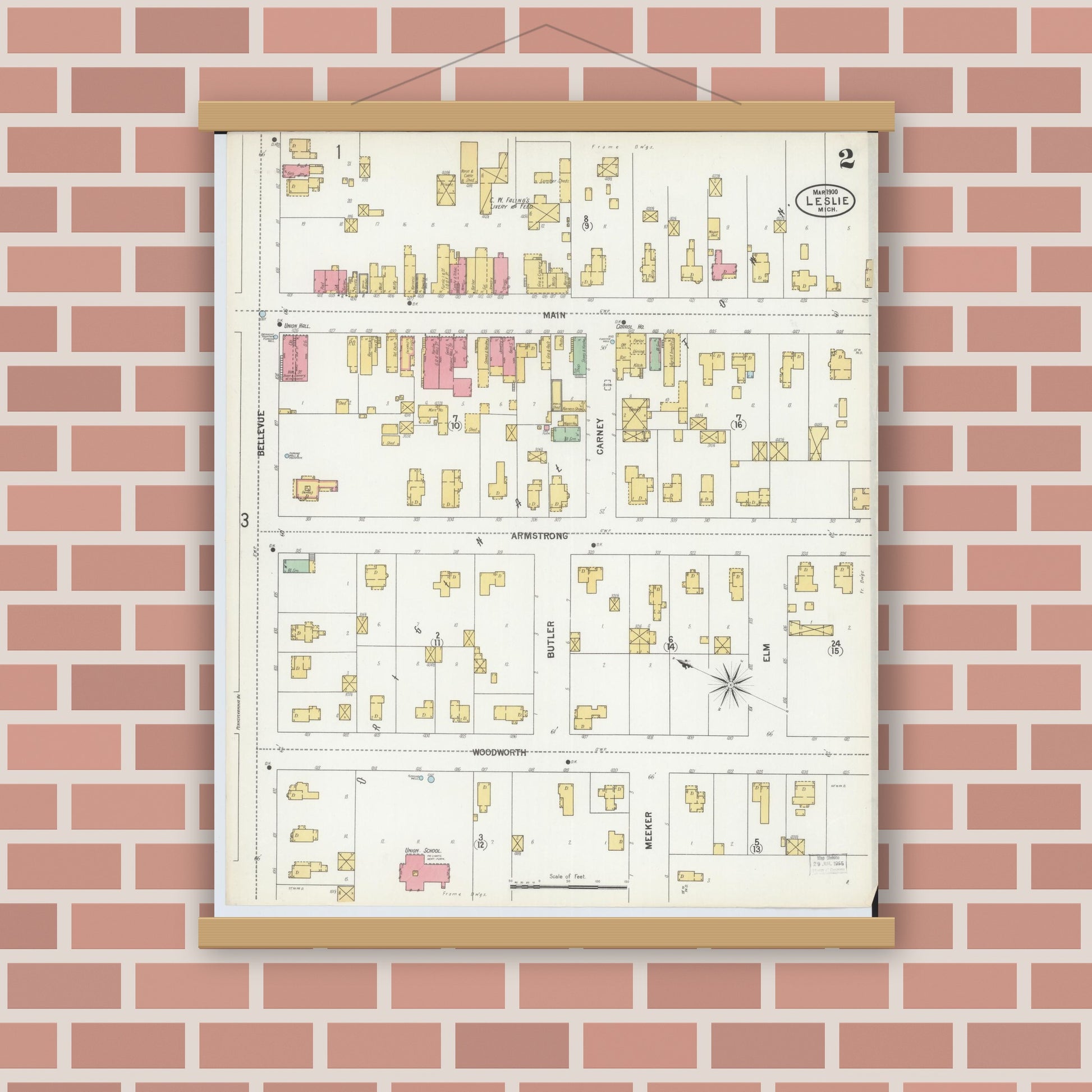 Old map wall art mockup — magnetic wood frame on brick wall — Sanborn Fire Insurance Map from Leslie, Ingham County, Michigan (1900), Sheet #0002