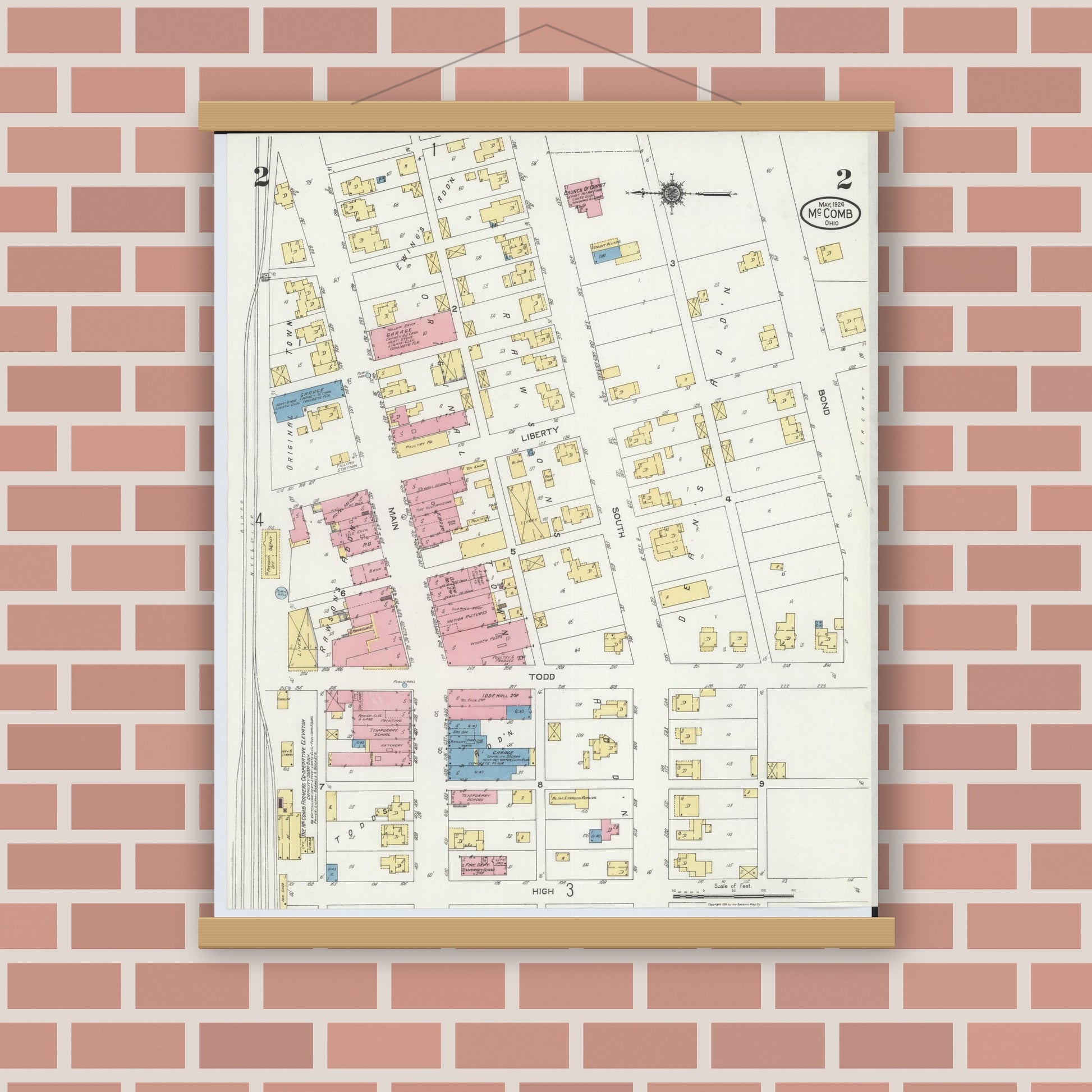 Old map wall art mockup — magnetic wood frame on brick wall — Sanborn Fire Insurance Map from McComb, Hancock County, Ohio (1924), Sheet #0002