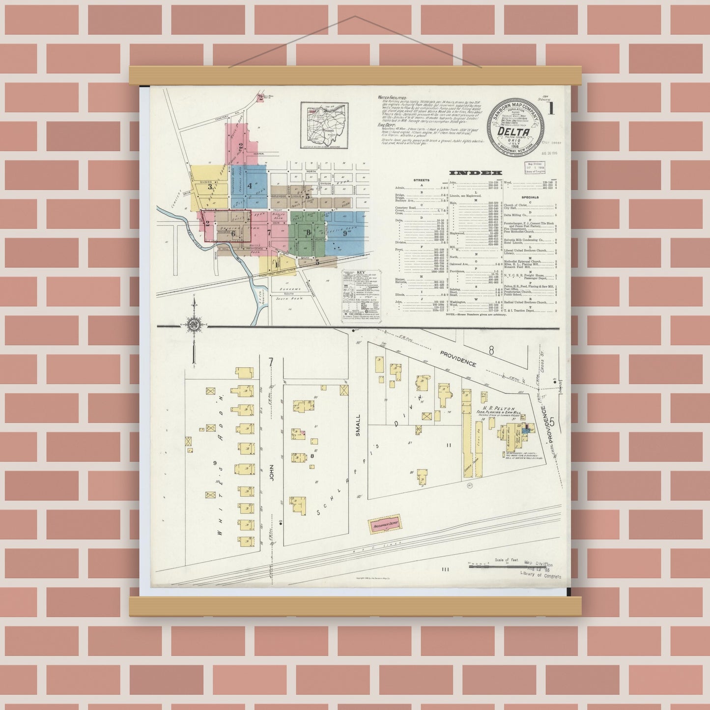 Old map wall art mockup — magnetic wood frame on brick wall — Sanborn Fire Insurance Map from Delta, Fulton County, Ohio (1916), Sheet #0001