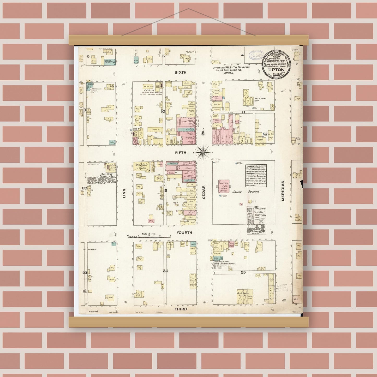 Old map wall art mockup — magnetic wood frame on brick wall — Sanborn Fire Insurance Map from Tipton, Cedar County, Iowa (1883), Sheet #0001