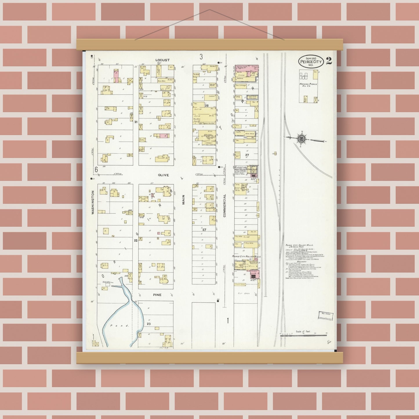 Old map wall art mockup — magnetic wood frame on brick wall — Sanborn Fire Insurance Map from Pierce City, Lawrence County, Missouri (1910), Sheet #0002