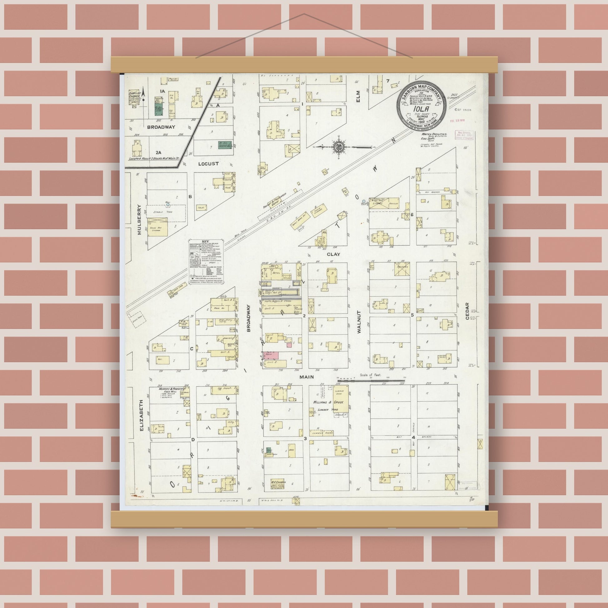 Old map wall art mockup — magnetic wood frame on brick wall — Sanborn Fire Insurance Map from Iola, Clay County, Illinois (1910), Sheet #0001