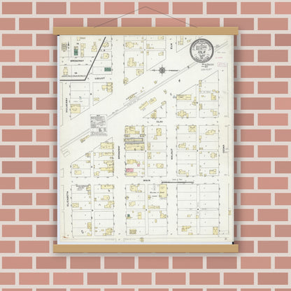 Old map wall art mockup — magnetic wood frame on brick wall — Sanborn Fire Insurance Map from Iola, Clay County, Illinois (1910), Sheet #0001