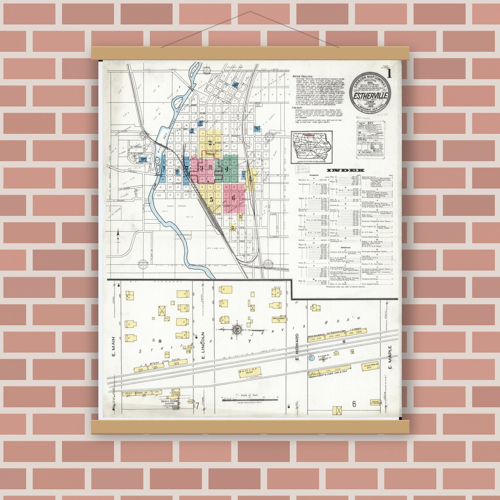 Old map wall art mockup — magnetic wood frame on brick wall — Sanborn Fire Insurance Map from Estherville, Emmet County, Iowa (1920), Sheet #0001