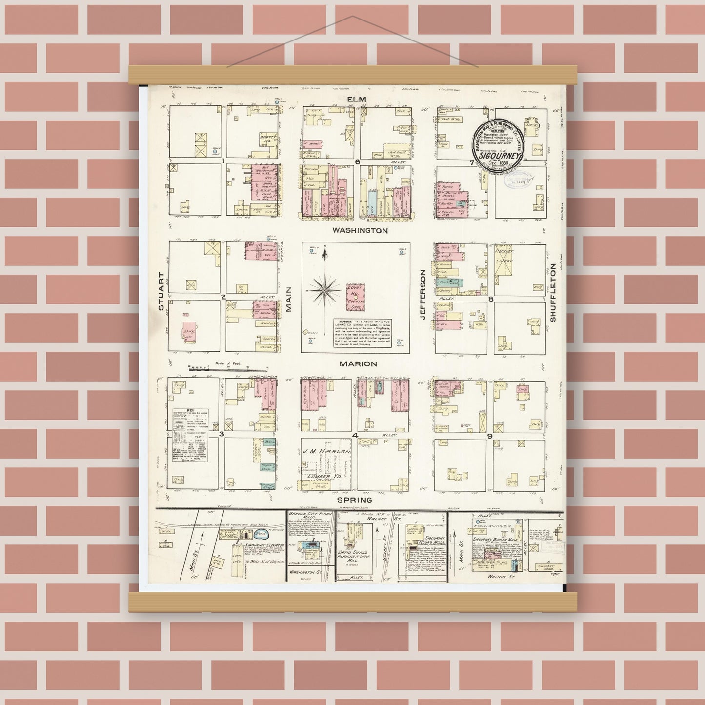 Old map wall art mockup — magnetic wood frame on brick wall — Sanborn Fire Insurance Map from Sigourney, Kiokuk County, Iowa (1883), Sheet #0001