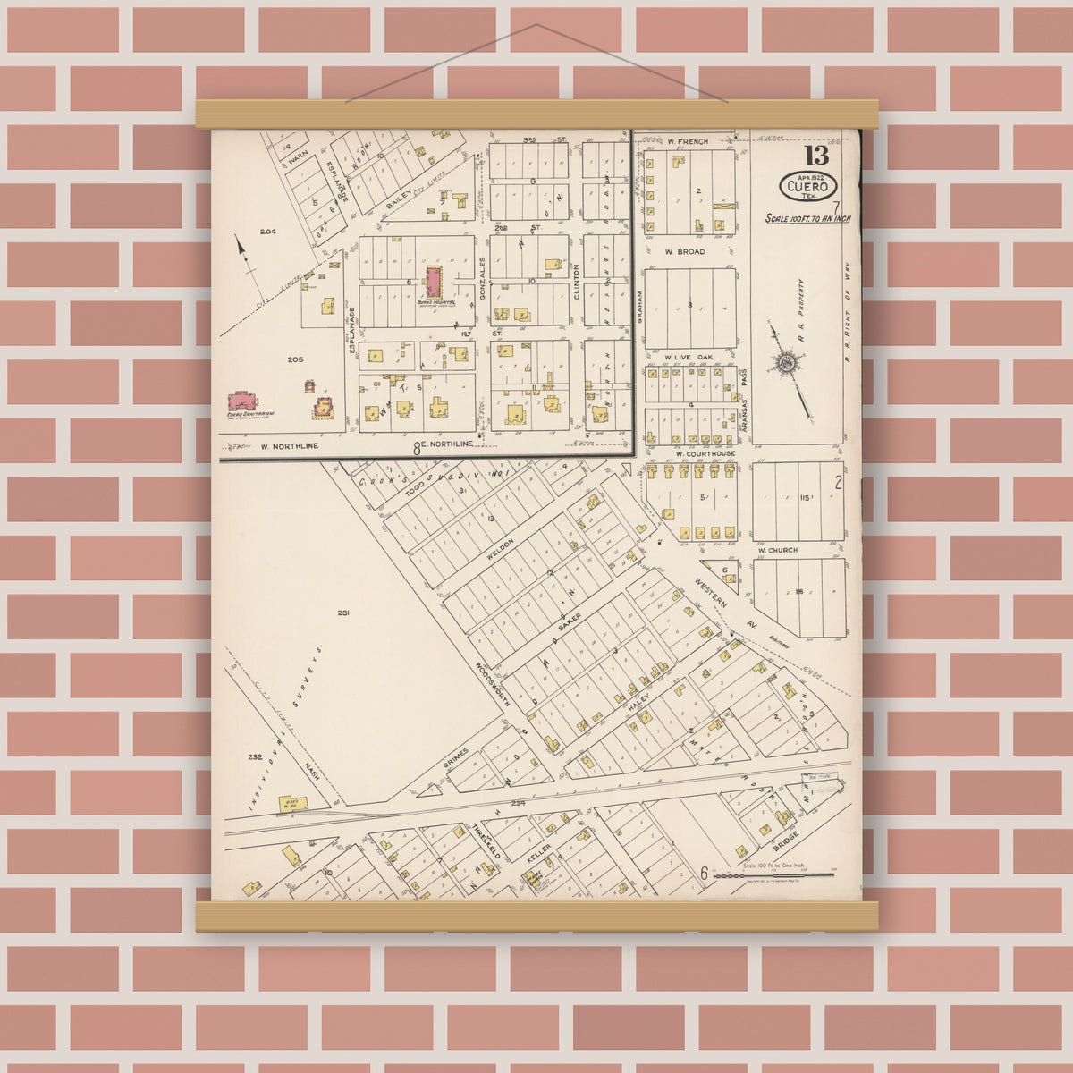 Old map wall art mockup — magnetic wood frame on brick wall — Sanborn Fire Insurance Map from Cuero, De Witt County, Texas (1922), Sheet #0013