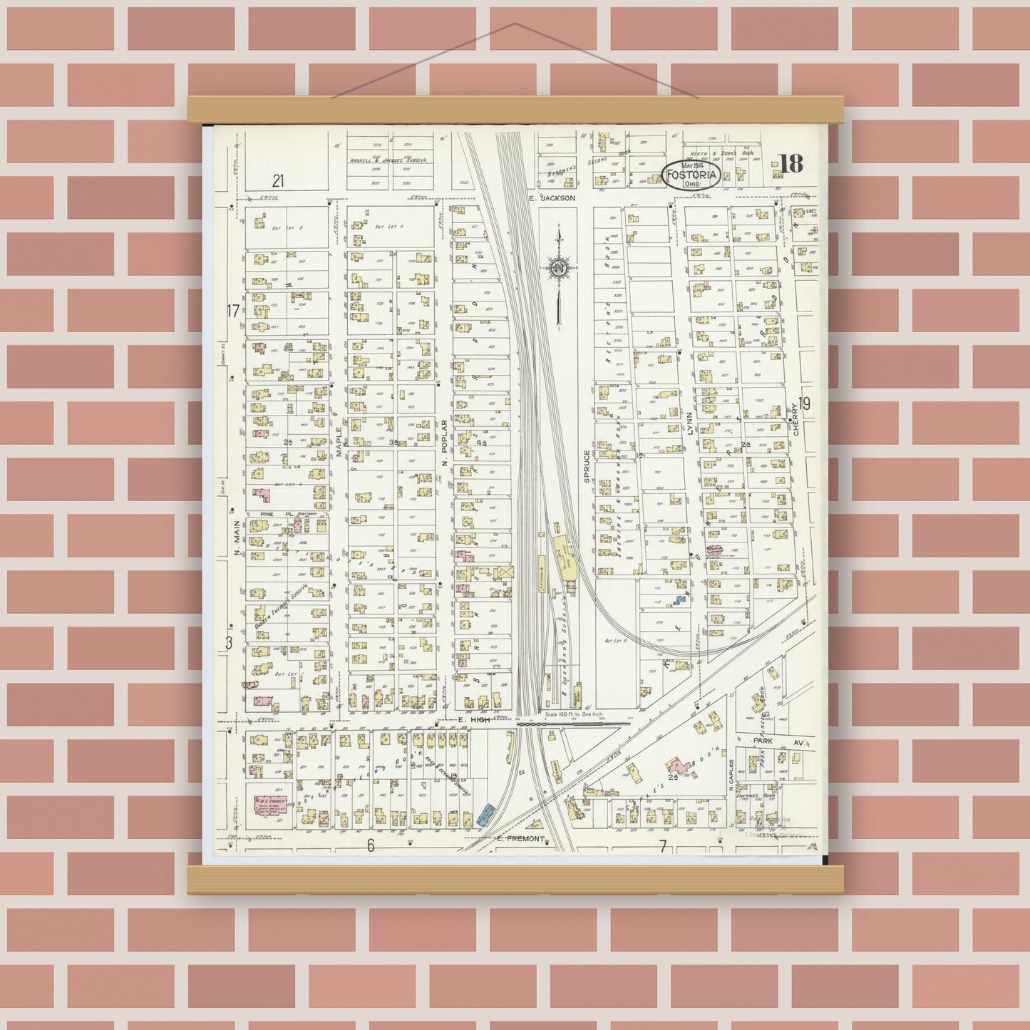 Old map wall art mockup — magnetic wood frame on brick wall — Sanborn Fire Insurance Map from Fostoria, Seneca, Hancock, And Wood Counties, Ohio (1914), Sheet #0018
