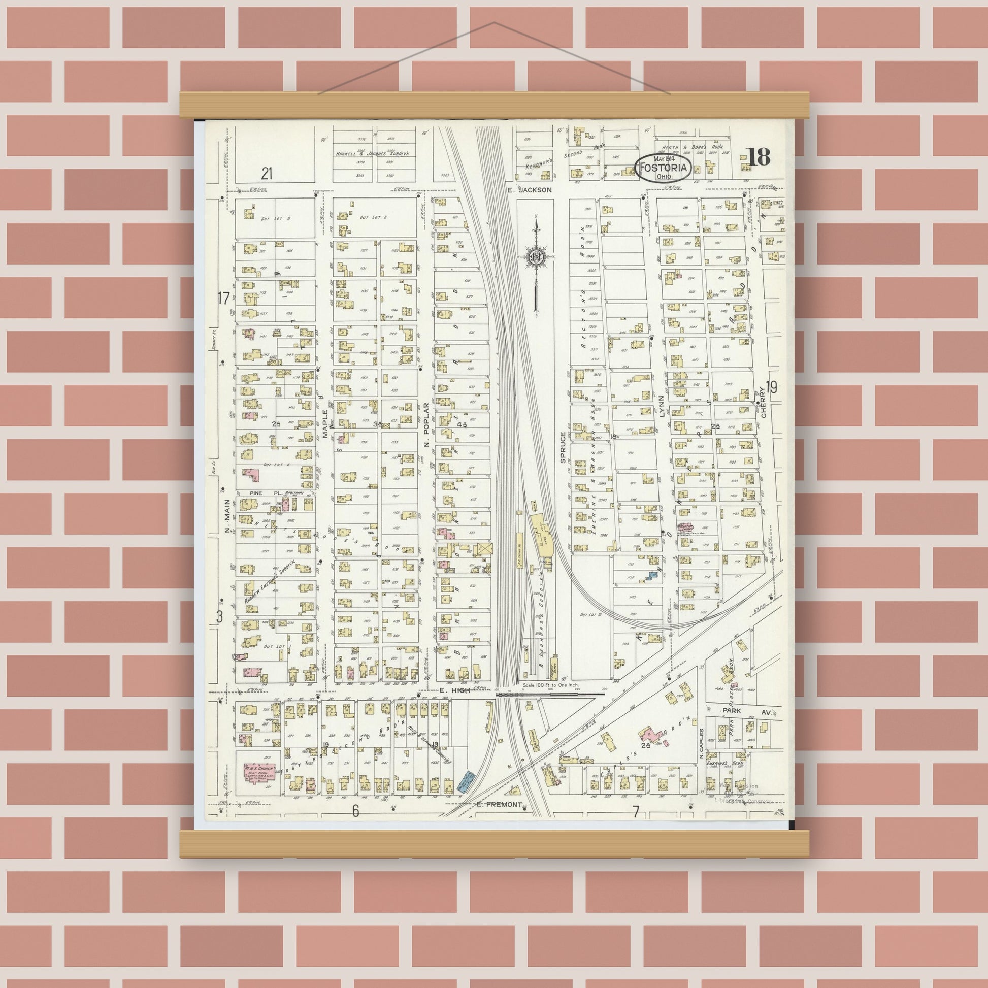 Old map wall art mockup — magnetic wood frame on brick wall — Sanborn Fire Insurance Map from Fostoria, Seneca, Hancock, And Wood Counties, Ohio (1914), Sheet #0018