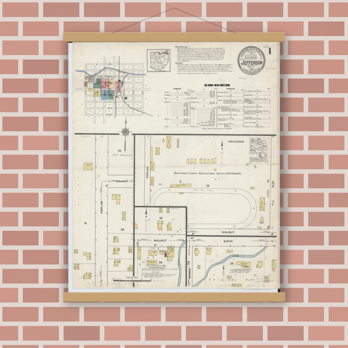 Old map wall art mockup — magnetic wood frame on brick wall — Sanborn Fire Insurance Map from Jefferson, Ashtabula County, Ohio (1915) - Complete Map Set
