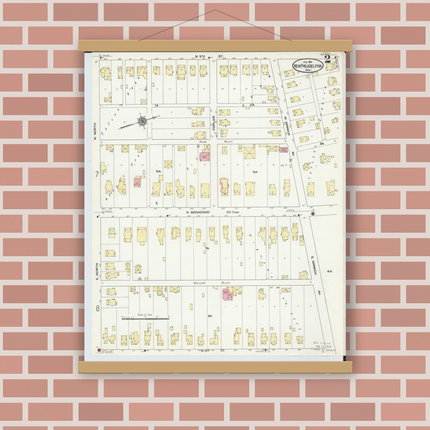 Old map wall art mockup — magnetic wood frame on brick wall — Sanborn Fire Insurance Map from New Philadelphia, Tuscarawas County, Ohio (1910), Sheet #0002