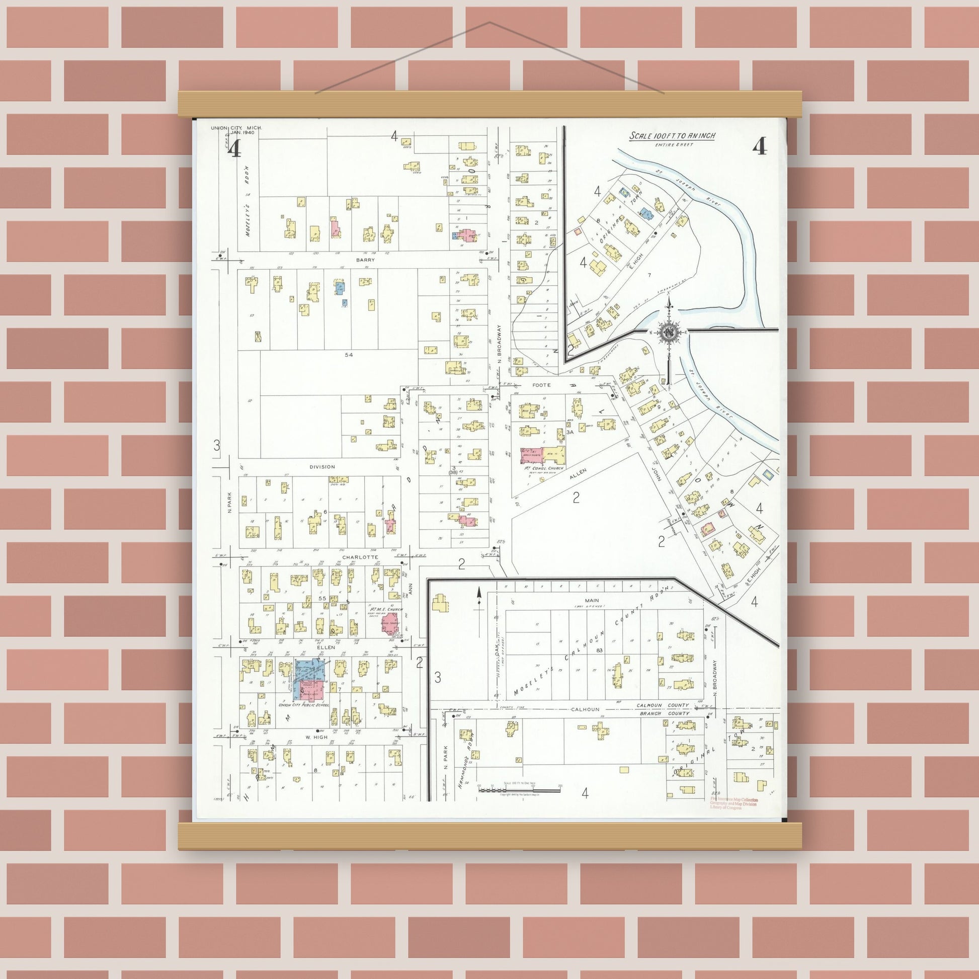 Old map wall art mockup — magnetic wood frame on brick wall — Sanborn Fire Insurance Map from Union City, Branch And Calhoun Counties, Michigan (1940), Sheet #0004